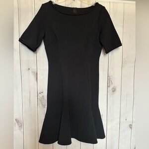 St. John Black Knit Fit & Flare Dress Size 8 Short Sleeve Peplum Hem